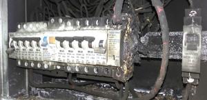LEAKY BOX: A leaking fuse box was the cause of this electrical fire that threatened property and life. Is yours waterproof?