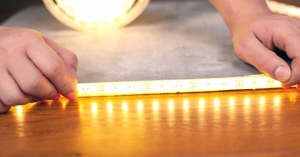 LED strip lighting being installed